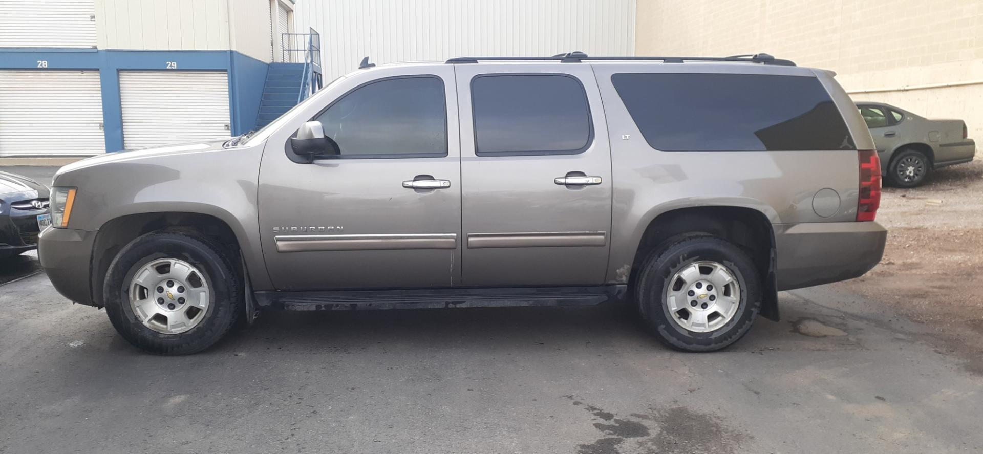 2012 Chevrolet Suburban (1GNSKJE77CR) with an 5.3L V8 OHV 16V FFV engine, 6-Speed Automatic transmission, located at 2015 Cambell Street, Rapid City, SD, 57701, (605) 342-8326, 44.066433, -103.191772 - Photo#0